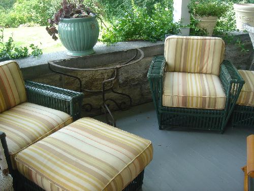 pair of Maine Cottage armchairs and ottomons